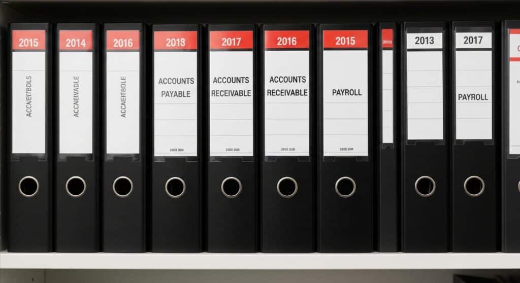 Neatly organized financial records prepared for a sales tax audit.